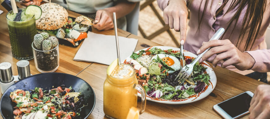 Group of people eating Brunch with drinks